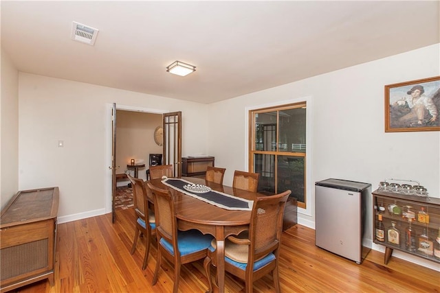 156 Oak Holw, Hammond, LA 70401 - dining space featuring light wood-style flooring and baseboards