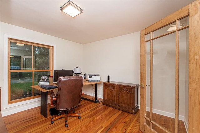 156 Oak Holw, Hammond, LA 70401 - office area featuring wood finished floors and baseboards
