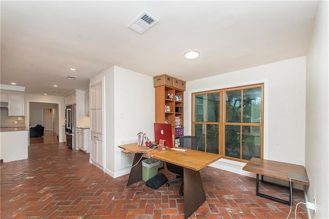 156 Oak Holw, Hammond, LA 70401 - office space featuring baseboards, brick floors, and recessed lighting
