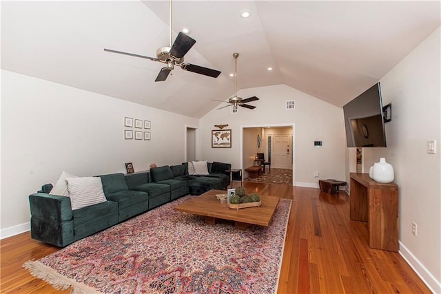 156 Oak Holw, Hammond, LA 70401 - living room with a ceiling fan, light wood-style flooring, lofted ceiling, baseboards, and recessed lighting