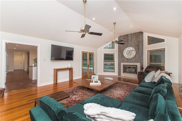 156 Oak Holw, Hammond, LA 70401 - living area featuring ceiling fan, wood finished floors, baseboards, a large fireplace, and recessed lighting