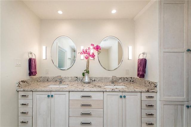 156 Oak Holw, Hammond, LA 70401 - full bathroom with double vanity and recessed lighting