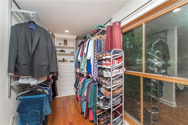 156 Oak Holw, Hammond, LA 70401 - walk in closet with wood finished floors