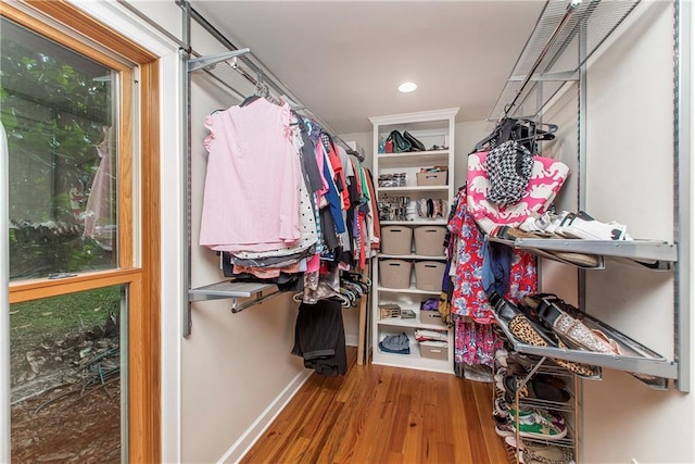 156 Oak Holw, Hammond, LA 70401 - walk in closet with wood finished floors
