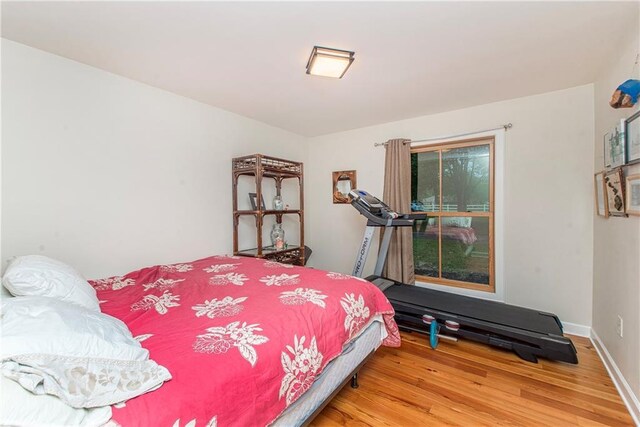 156 Oak Holw, Hammond, LA 70401 - bedroom with wood finished floors and baseboards