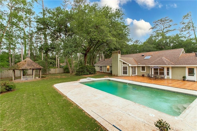 156 Oak Holw, Hammond, LA 70401 - view of swimming pool with a gazebo, a patio area, and view of wooded area