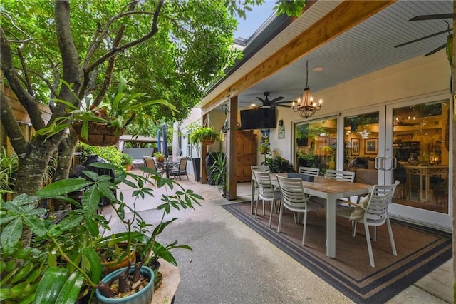 view of patio / terrace featuring outdoor dining space and ceiling fan