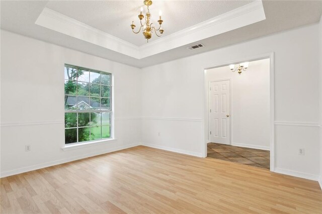 1155 Milan Dr, Mandeville, LA 70448 - spare room with light wood-style flooring, ceiling fan, and a textured ceiling