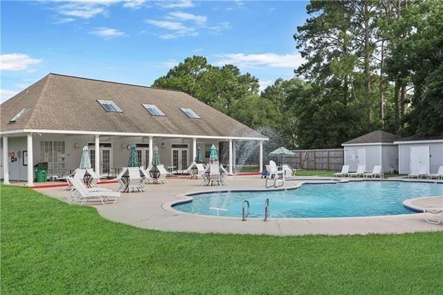 1155 Milan Dr, Mandeville, LA 70448 - community pool featuring a patio area