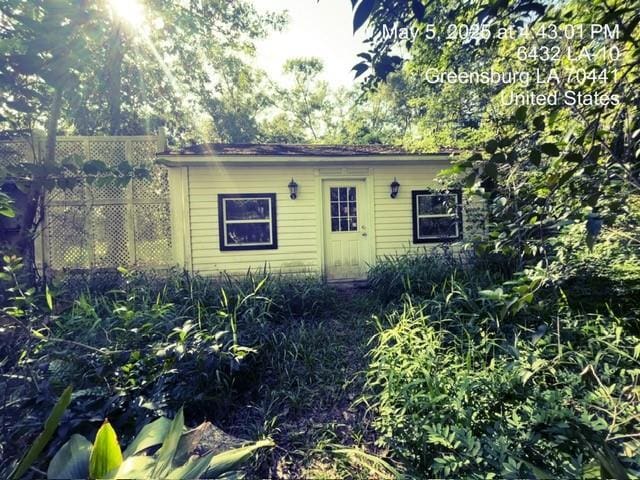 6396 10th Hwy, Greensburg, LA 70441 - view of outdoor structure with fence