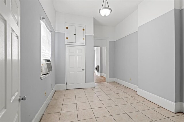 2025 Conti St, New Orleans, LA 70112 - unfurnished room featuring light tile patterned floors and baseboards