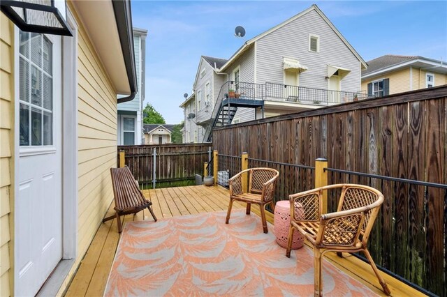 215 N Scott St, New Orleans, LA 70119 - view of patio / terrace featuring a fenced backyard and a wooden deck
