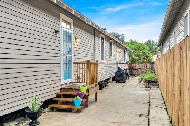 3310 Delachaise St, New Orleans, LA 70125 - view of patio with fence, a gate, and grilling area