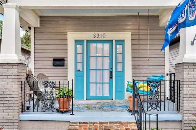 3310 Delachaise St, New Orleans, LA 70125 - view of exterior entry featuring a porch