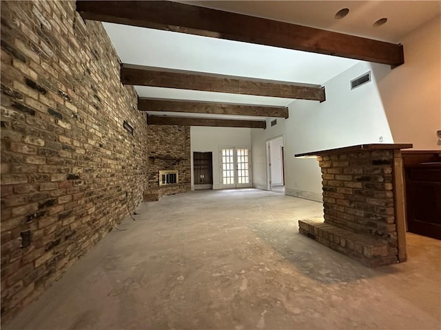 4408 Janice Ave, Metairie, LA 70003 - unfurnished living room featuring a brick fireplace and beamed ceiling