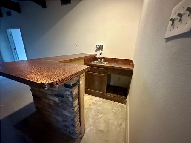4408 Janice Ave, Metairie, LA 70003 - indoor wet bar with unfinished concrete floors