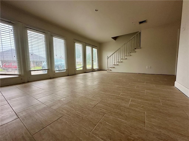 4408 Janice Ave, Metairie, LA 70003 - unfurnished living room with stairway