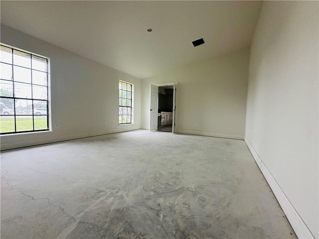 4408 Janice Ave, Metairie, LA 70003 - unfurnished room with unfinished concrete floors and vaulted ceiling