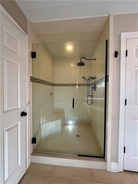 4408 Janice Ave, Metairie, LA 70003 - full bathroom featuring a stall shower and tile patterned flooring