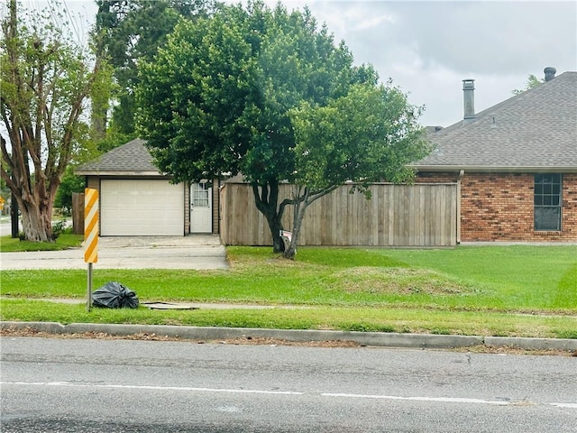 4408 Janice Ave, Metairie, LA 70003 - view of front facade with brick siding, roof with shingles, driveway, and a garage