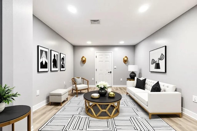 3017 Music St, New Orleans, LA 70122 - living area with light wood-type flooring, recessed lighting, and baseboards