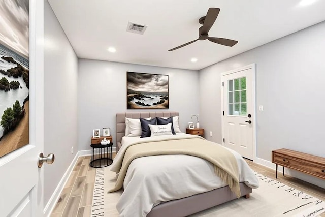 3017 Music St, New Orleans, LA 70122 - bedroom with light wood finished floors, baseboards, recessed lighting, and a ceiling fan