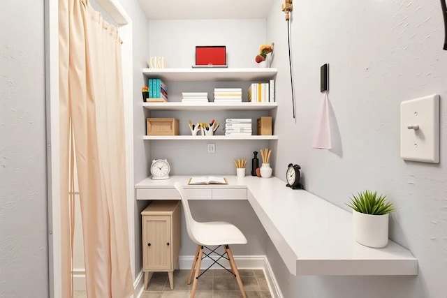 3017 Music St, New Orleans, LA 70122 - office area with built in desk and tile patterned flooring