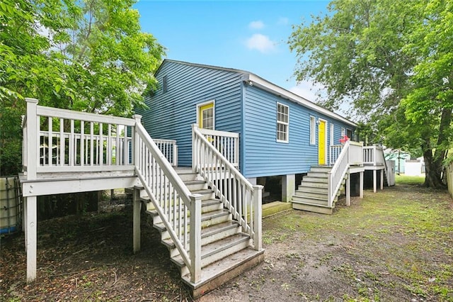 3017 Music St, New Orleans, LA 70122 - view of property exterior featuring stairs and a deck