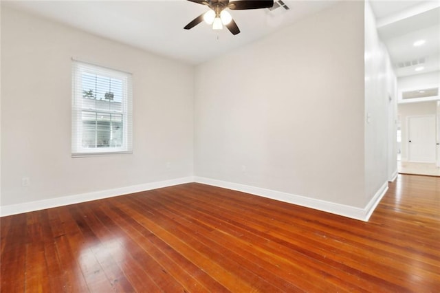 838 Jefferson St, Gretna, LA 70053 - empty room featuring baseboards, hardwood / wood-style floors, and a ceiling fan
