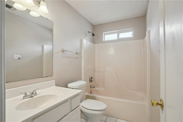 937 Crestwood Dr, Covington, LA 70433 - bathroom featuring vanity, washtub / shower combination, toilet, a textured ceiling, and tile patterned floors