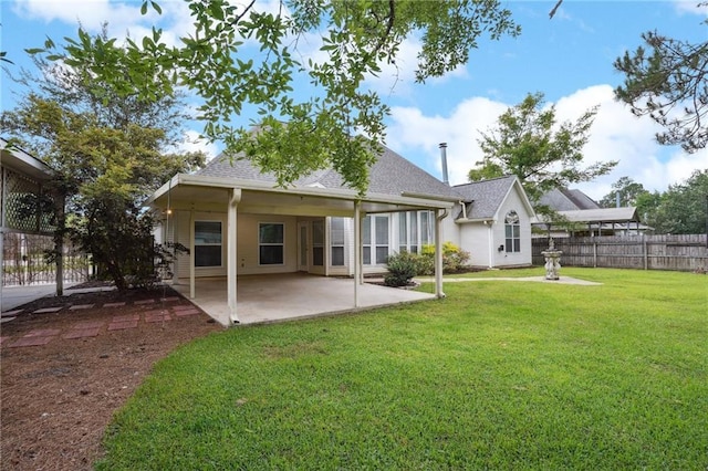 937 Crestwood Dr, Covington, LA 70433 - back of property featuring a patio area and roof with shingles