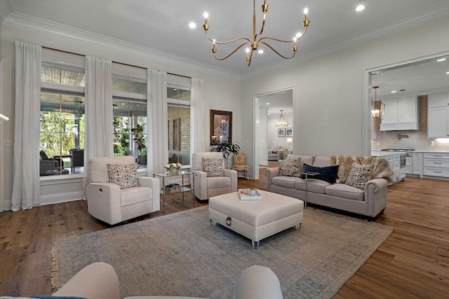 972 Camphill Dr, Abita Springs, LA 70420 - living area featuring a chandelier, crown molding, wood finished floors, and recessed lighting