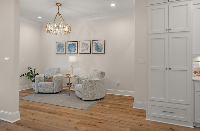 972 Camphill Dr, Abita Springs, LA 70420 - sitting room featuring baseboards, light wood-style flooring, crown molding, a chandelier, and recessed lighting