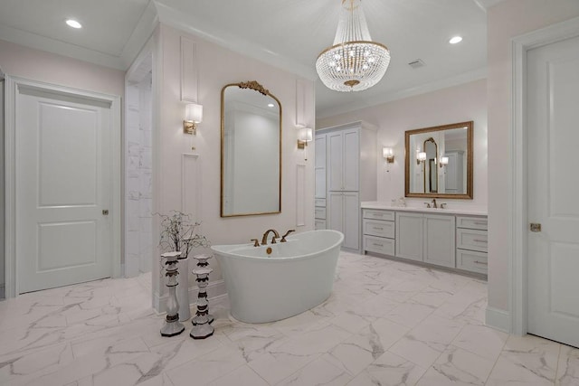 972 Camphill Dr, Abita Springs, LA 70420 - full bath featuring marble look tile flooring, a soaking tub, vanity, crown molding, and a chandelier