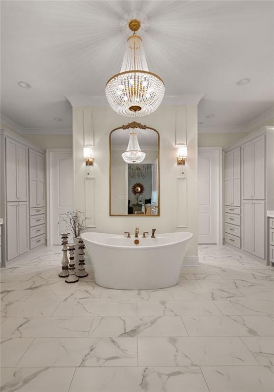 972 Camphill Dr, Abita Springs, LA 70420 - full bathroom featuring a chandelier, a freestanding tub, crown molding, and marble look tile flooring