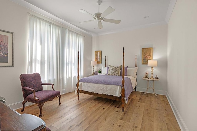 972 Camphill Dr, Abita Springs, LA 70420 - bedroom with light wood-style floors, baseboards, ceiling fan, and crown molding