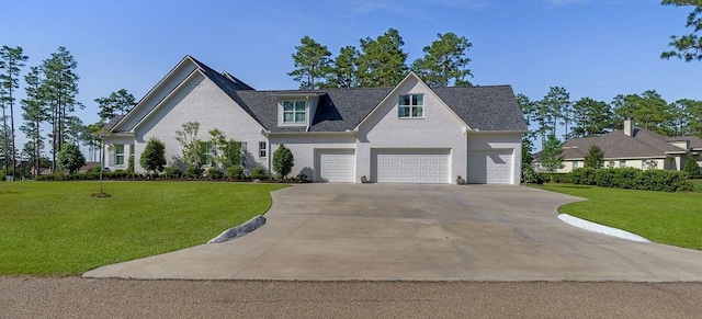972 Camphill Dr, Abita Springs, LA 70420 - view of front of house with a front lawn, concrete driveway, and an attached garage