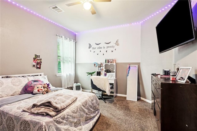 bedroom with carpet flooring, baseboards, and ceiling fan