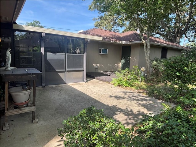 3902 Croydon St, Slidell, LA 70458 - back of property with a sunroom and a patio area