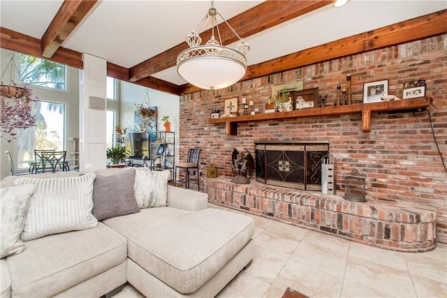 living room featuring beamed ceiling, tile patterned flooring, brick wall, a fireplace, and a high ceiling