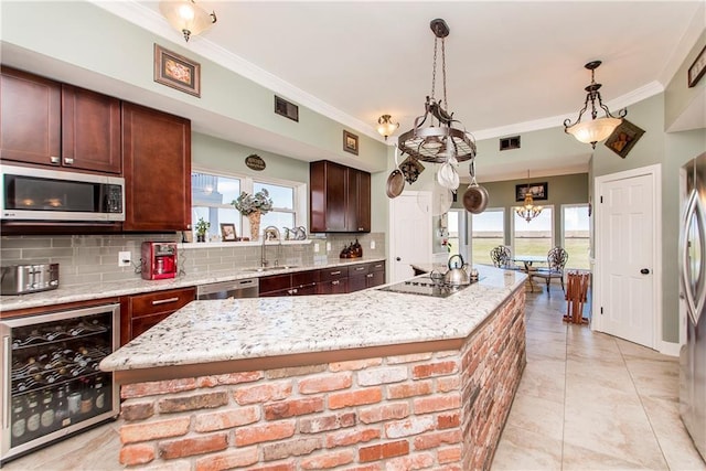 kitchen featuring stainless steel appliances, beverage cooler, a sink, tasteful backsplash, and crown molding