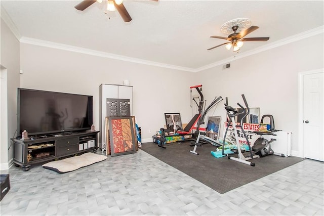 exercise area featuring a ceiling fan, crown molding, and baseboards