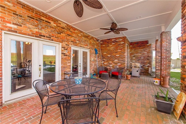 view of patio featuring french doors, ceiling fan, and a grill