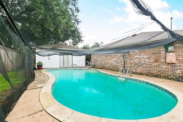 view of pool with fence