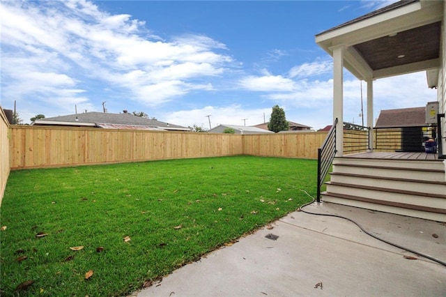 view of yard featuring a wooden deck