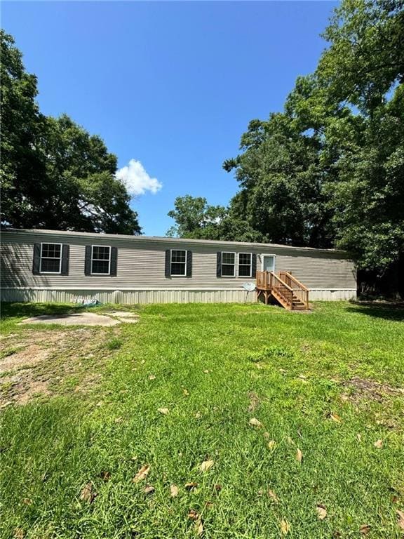 2329 W Schambers St, Basile, LA 70515 - view of front facade featuring a front lawn