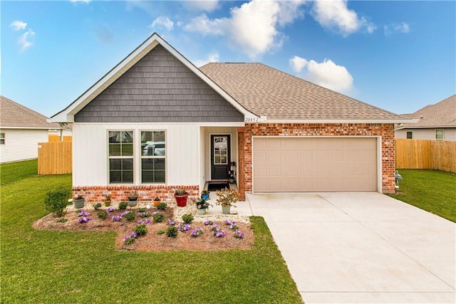 20452 Cornerstone Rd, Hammond, LA 70401 - view of front of house with brick siding, driveway, and an attached garage