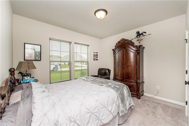 20452 Cornerstone Rd, Hammond, LA 70401 - bedroom with light carpet and baseboards
