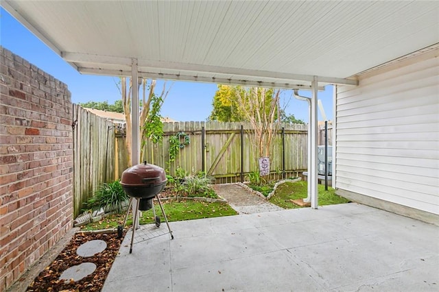 300 Terry Pkwy Unit B, Terrytown, LA 70056 - view of patio / terrace featuring a grill and a fenced backyard