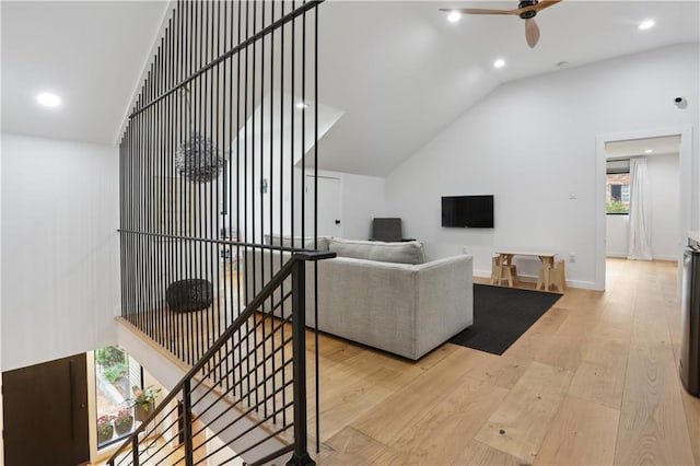 1712 Upperline St, New Orleans, LA 70115 - living area featuring a ceiling fan, wood finished floors, vaulted ceiling, recessed lighting, and baseboards